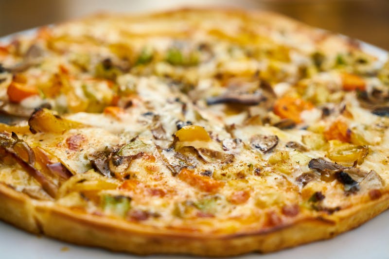 Veggie deep dish pizza with fresh vegetables